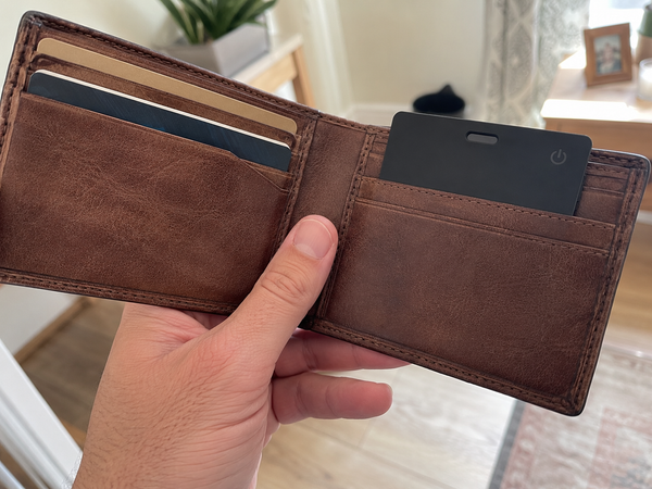 Photo review slot — customer's wallet in hand